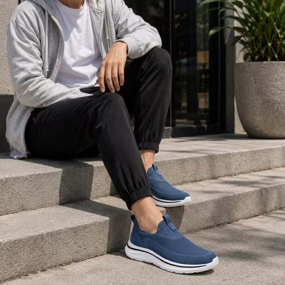 Blue knit slip-on sneakers with cushioned sole and low-profile design