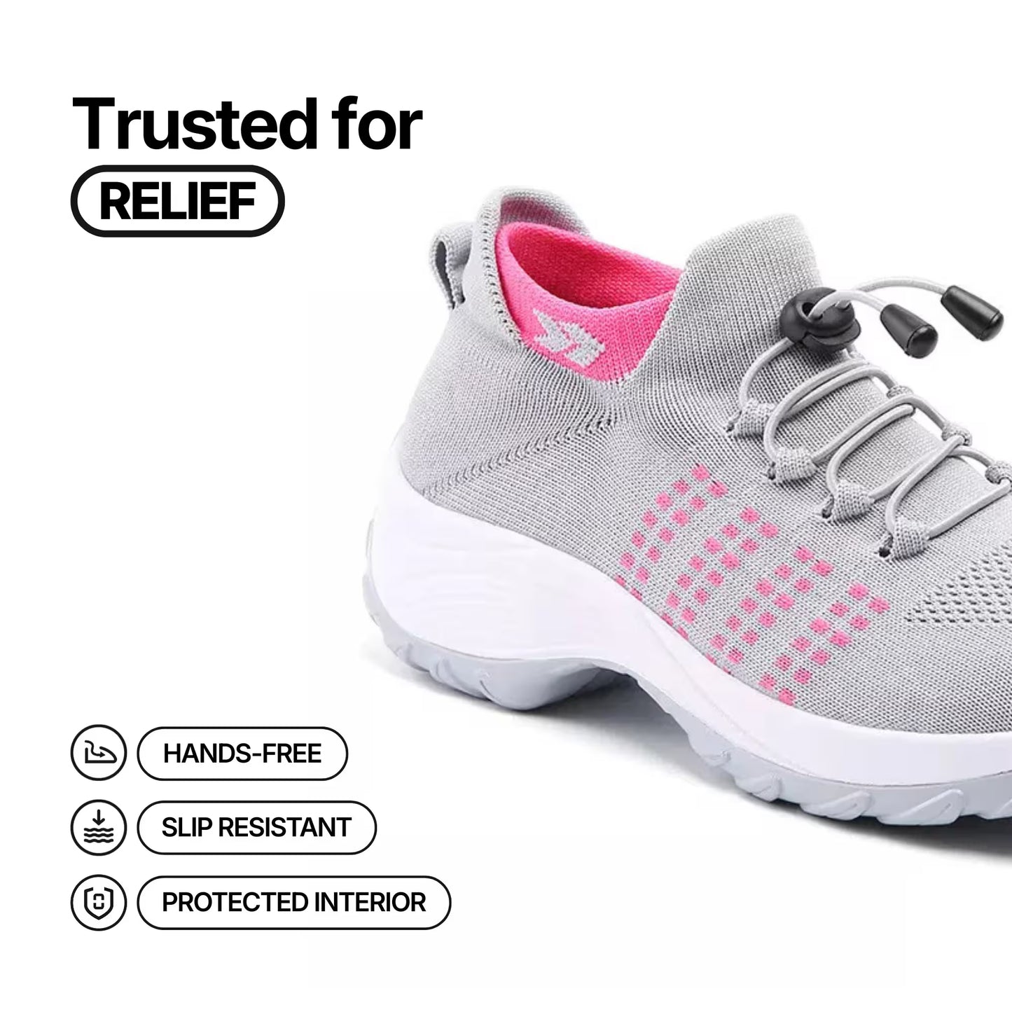 Light gray ankle sneaker with pink crosshatch accents, lace-up and grippy outsole