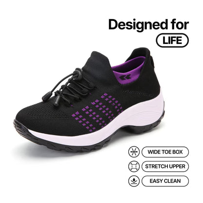 Cloud-Step orthopedic relief shoe: black knit upper with purple pattern, white sole.