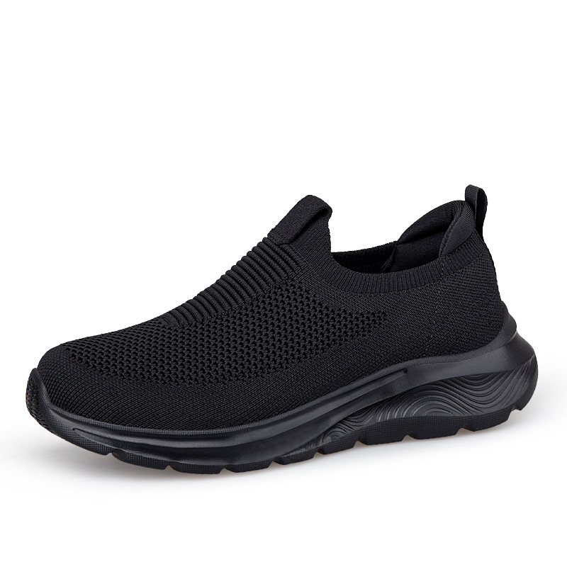 Slip-on sneakers in black knit with dark cushioned sole